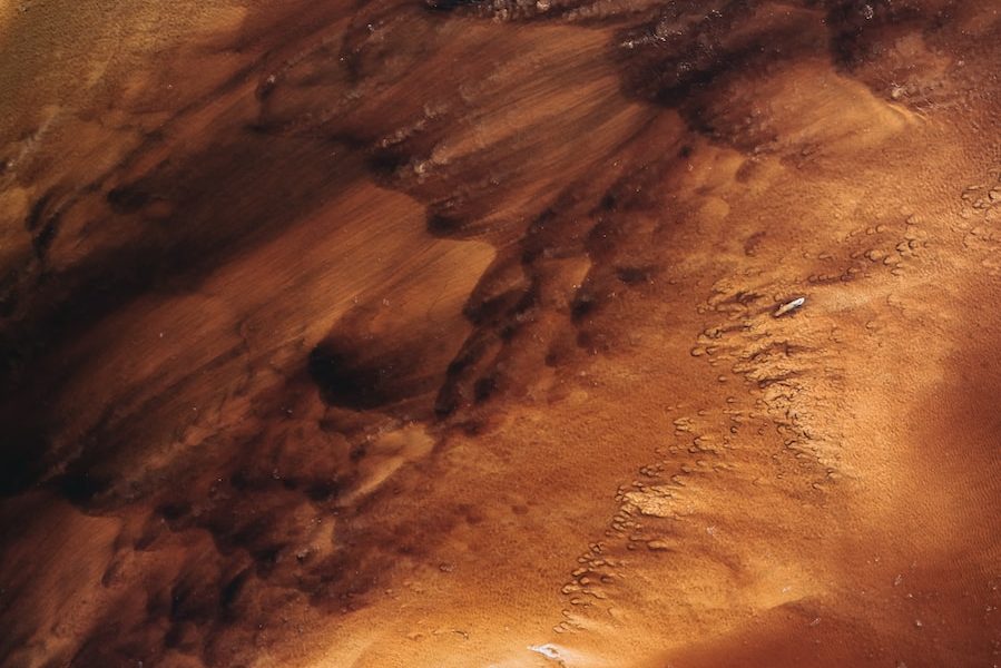 a close up of a brown substance on a surface